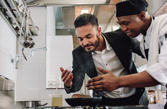 Cook and client smelling food